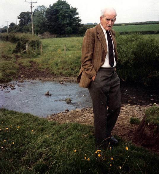 John with Blockmill, near Stewarton, Ayrshire in the distance.